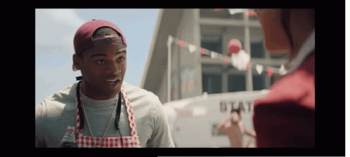 Man In Apron And Hat Talking GIF