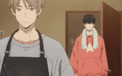 Man In Apron And Red Hoodie Standing GIF