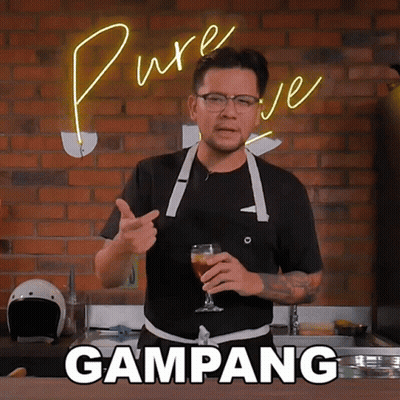Man In Apron Holding Beer With Gampang GIF