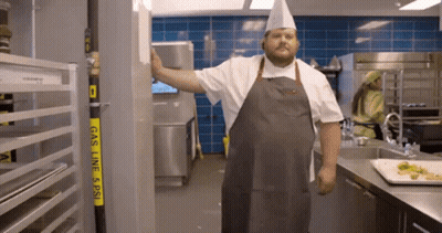 Man In Apron Next To Gas Line 5 PSI Sign GIF