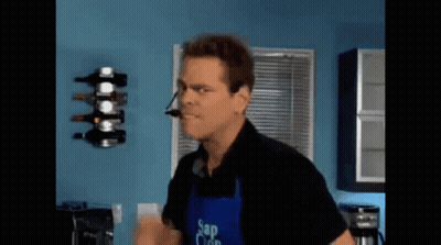 Man In Apron Saying Sap Clean In Kitchen GIF
