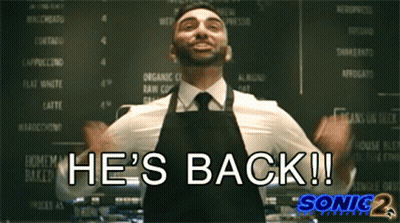 Man In Apron Says He's Back At Menu Board GIF
