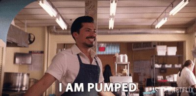 Man In Apron Smiling Says I Am Pumped GIF
