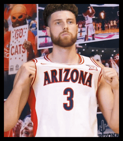 Man In Arizona Jersey Holding Fist Up GIF