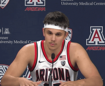 Man In Arizona Jersey Talking Into Microphone GIF