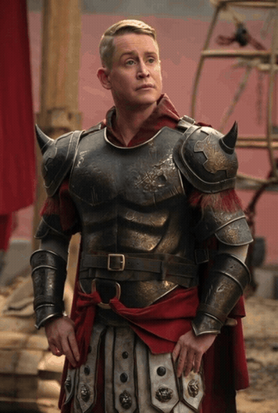 Man In Armor And Red Cape By Red Wall GIF