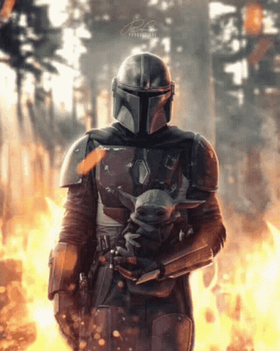 Man In Armor Holding Baby Yoda Before Forest Fire GIF