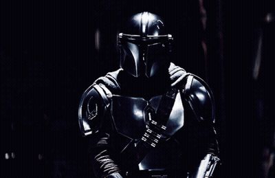 Man In Armor Holding Lightsaber GIF