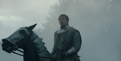 Man In Armor Riding Horse In Rain GIF