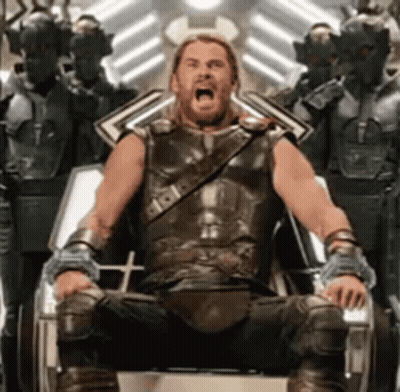 Man In Armor Sitting On Throne With Open Mouth GIF