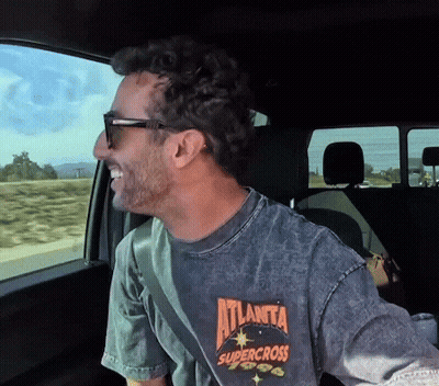 Man In Atlanta Supercross T-Shirt Sitting In Car GIF
