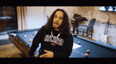 Man In Atlanta Sweatshirt By Pool Table GIF