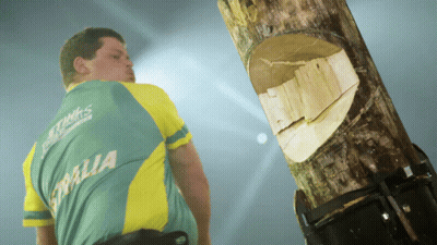 Man In Australia Shirt Next To Log GIF