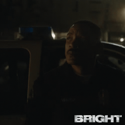Man In Back Seat Looking Out Window GIF