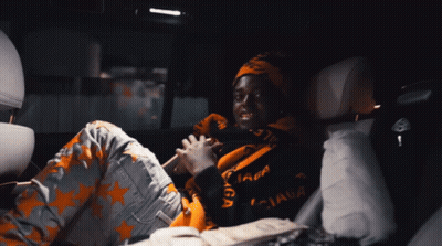 Man In Back Seat Wearing Balenciaga Sweater GIF