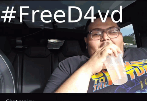 Man In Back To The Future Shirt Drinking GIF