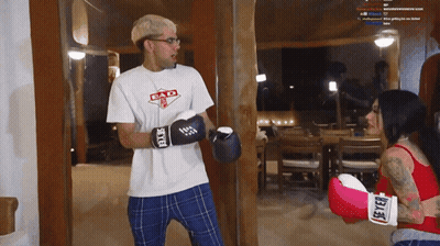 Man In Bad Shirt Boxing Woman GIF