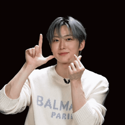 Man In Balma Paris Sweater Making Heart Shape GIF