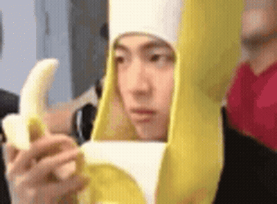 Man In Banana Costume Holding Banana GIF