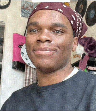 Man In Bandana And Black Shirt Smiling GIF