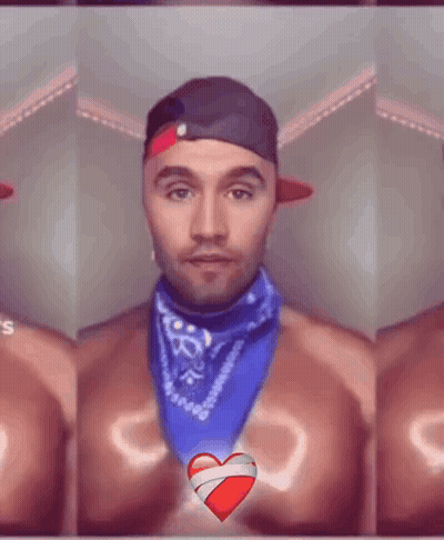 Man In Bandana And Hat In Front Of Red Heart GIF