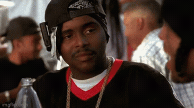 Man In Bandana And Hat Sitting At Table With Water Bottle GIF