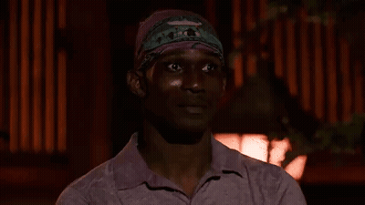 Man In Bandana And Pink Shirt Making Funny Face GIF