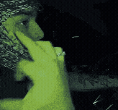 Man In Bandana And Ring Making Funny Face GIF