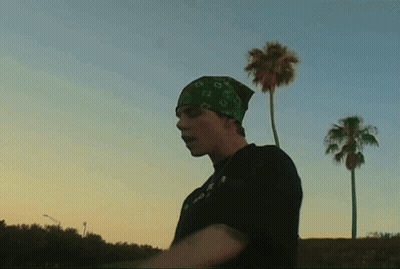 Man In Bandana And T-Shirt Saying A GIF