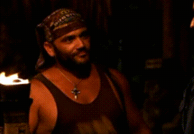 Man In Bandana Holding Torch GIF
