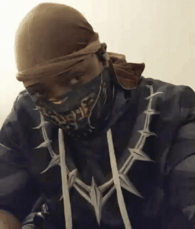 Man In Bandana, Hoodie, And Necklace GIF