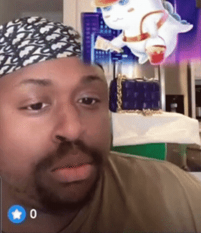 Man In Bandana Looking At Camera With Blue Star GIF