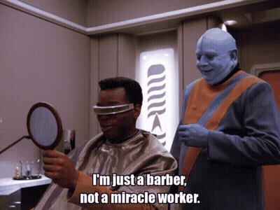 Man In Barber Chair Looking At Mirror GIF