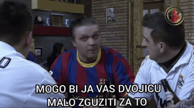 Man In Barcelona Shirt Talking To Two Men GIF
