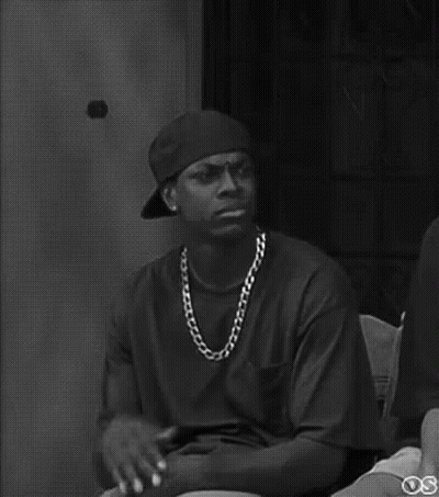 Man In Baseball Cap And Chain Black And White GIF