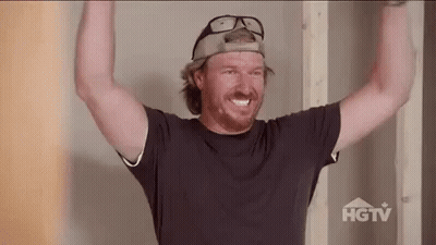 Man In Baseball Cap And Glasses Holding Arms Up GIF