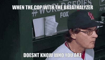 Man In Baseball Cap And Glasses Says When The Cop With The Breathalyzer GIF