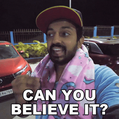 Man In Baseball Cap And Pink Scarf Says Can You Believe It GIF