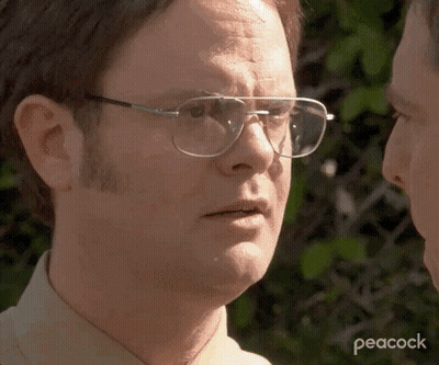 Man In Baseball Cap And Striped Shirt Writing On Face GIF