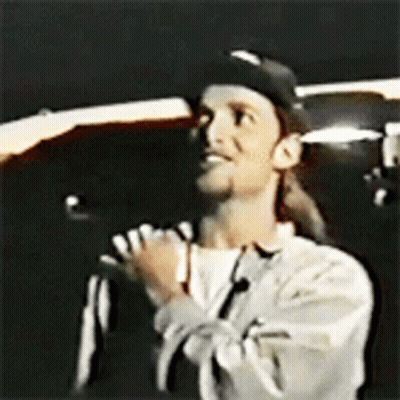 Man In Baseball Cap And White Shirt GIF