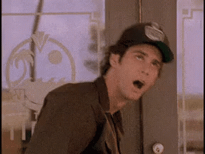 Man In Baseball Cap At Door GIF