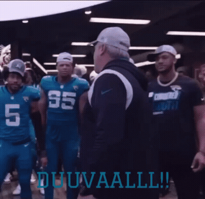 Man In Baseball Cap Dancing In Front Of Football Players Duuvaall GIF