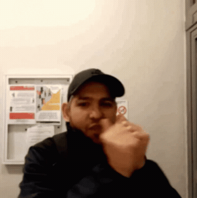 Man In Baseball Cap Giving Thumbs Up GIF