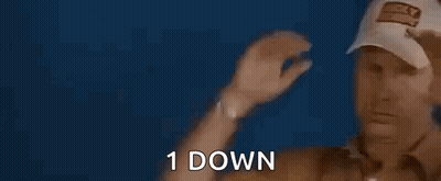 Man In Baseball Cap Holding Head Saying 1 Down GIF
