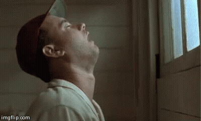 Man In Baseball Cap Looking Up GIF