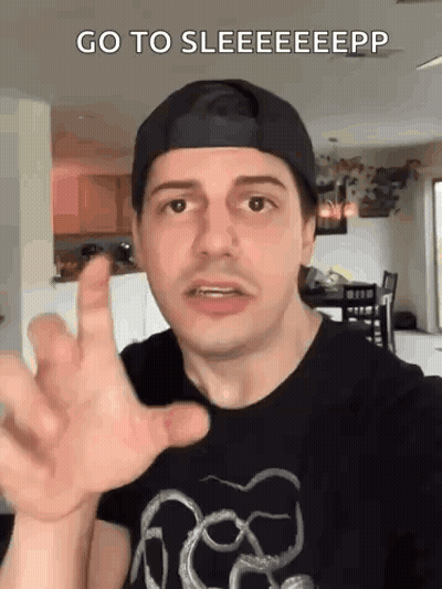 Man In Baseball Cap Making Funny Face GIF