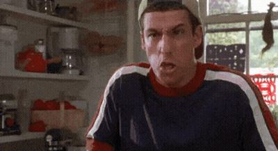Man In Baseball Cap Making Funny Face In Kitchen GIF