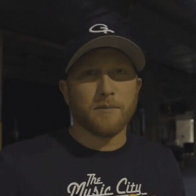 Man In Baseball Cap Saying Bummer GIF