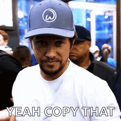 Man In Baseball Cap Saying Yeah Copy That GIF