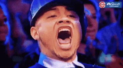 Man In Baseball Cap Screaming In Crowd GIF